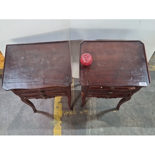 1173 - Star Lot : A Pair of Victorian style mahogany bedside tables with ornate carved detailing, three dra... 