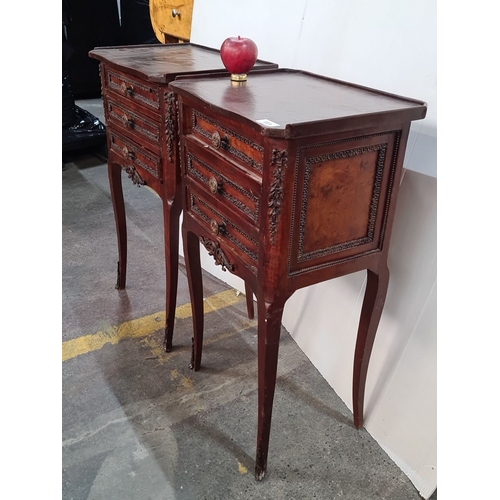 1173 - Star Lot : A Pair of Victorian style mahogany bedside tables with ornate carved detailing, three dra... 