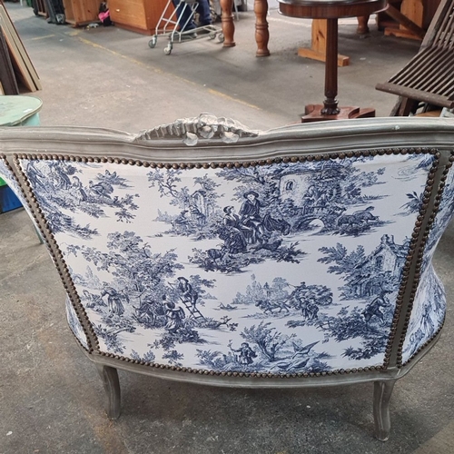 1176 - Star Lot : Louis XV style bergère with blue and white toile upholstery, featuring carved wood detail... 