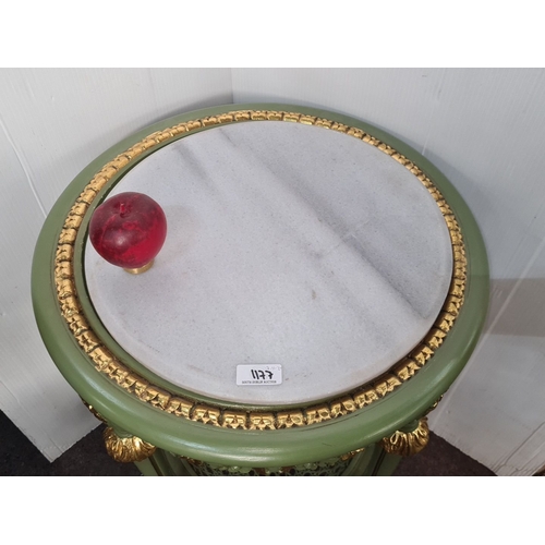 1177 - Star Lot : A very elegant Green and gold marble-topped side table with floral details and woven lowe... 