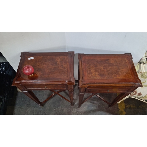 1190 - Star lot A hands Pair of mahogany side tables feature burl wood inlay and a single drawer, supported... 