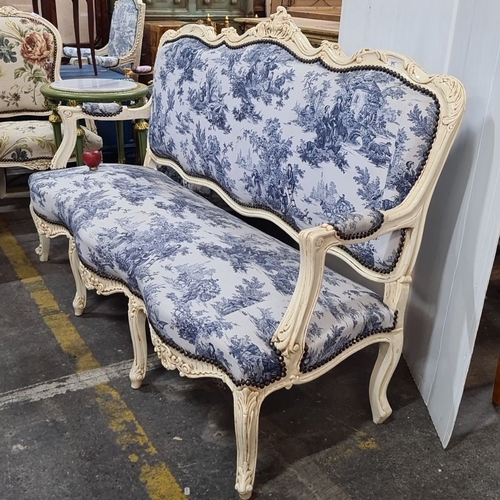 1195 - Star lot  : A French-style Louis XVI style settee, intricately carved wood frame with toile de Jouy ... 