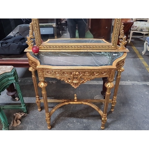 1196 - Star Lot : A beautiful Ornate gilded console table with mirror, featuring intricate carving and a ma... 