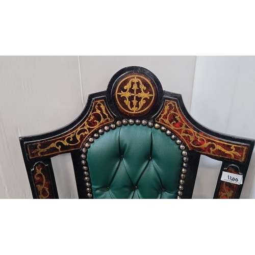 1200 - Star Lot : Victorian ebonized chair featuring green tufted upholstery and intricate gilt stenciling.... 