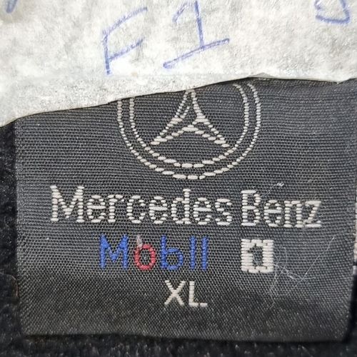 991 - Mercedes Benz Mobil 1 team jacket features embroidered logos and zip pockets. XL