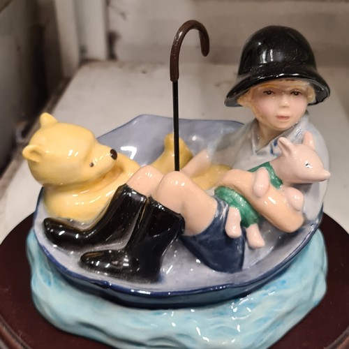 130 - An adorable limited Royal Doulton figure from The Winnie-the-Pooh collection titled 