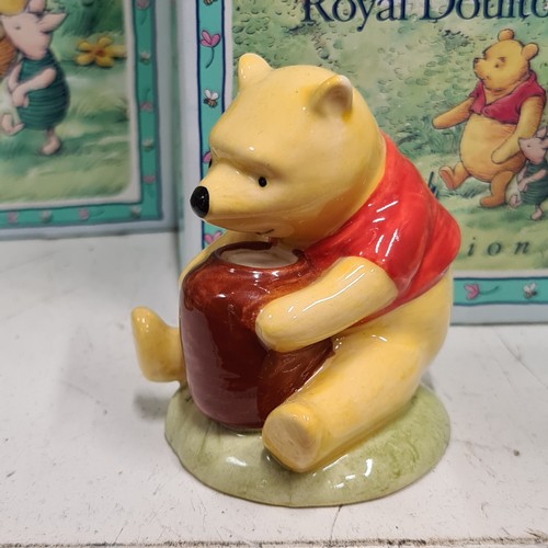 131 - Star Lot : A selection of nine Royal Doulton figurines from the Winnie-the-Pooh collection, includes... 