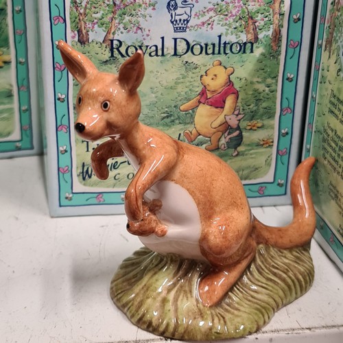 131 - Star Lot : A selection of nine Royal Doulton figurines from the Winnie-the-Pooh collection, includes... 