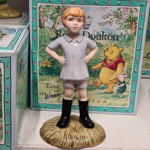 131 - Star Lot : A selection of nine Royal Doulton figurines from the Winnie-the-Pooh collection, includes... 