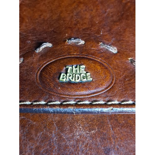 176 - A beautiful 'The Bridge' vintage leather handbag in cognac leather with brass hardware. In good cond... 