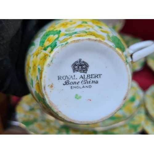 295 - A wonderful Royal Albert 20 piece porcelain tea set in the bright Yellow Primrose floral chintz patt... 