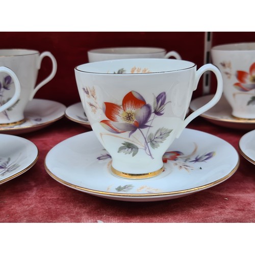 297 - A pretty Royal Albert tea set in the Water Meadow pattern. Includes ten cups and saucers.