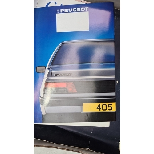 334 - Box of approximately 50 original classic car sales brochures, featuring models like Peugeot 405. Inc... 