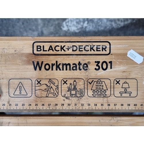 692 - Portable folding workbench with integrated vise, adjustable wood panels.