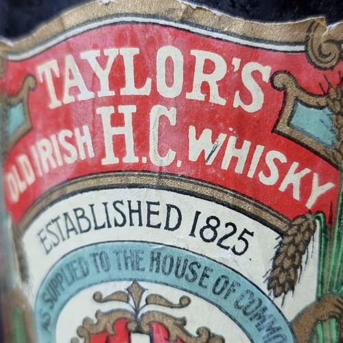 665 - Star lot : A vintage bottle of Taylor's Old irish H.C Whisky. 