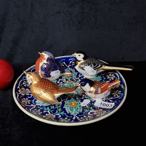 1003 - A lot including four charming Royal Crown Derby Imari paperweights including Pied Wagtail and Coal T... 