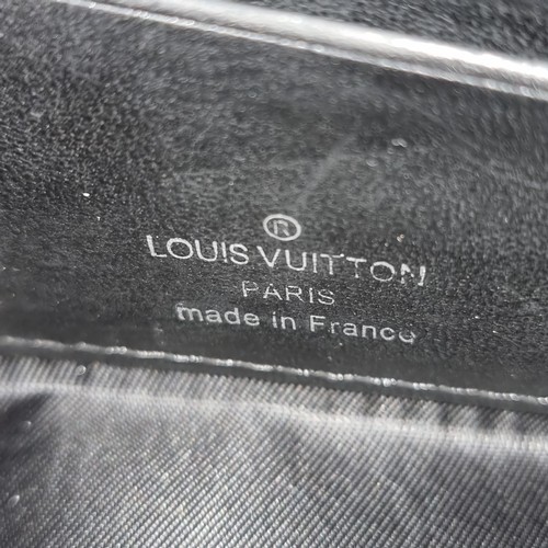 1026 - A trio of designer  wallets All marked Louis Vuitton including leather card holder, a playful Love H... 