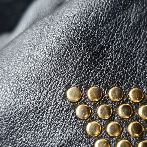 1028 - An original designer Jimmy Choo black leather gold studded zulu zipper top clutch bag. RRP: $279 Ser... 