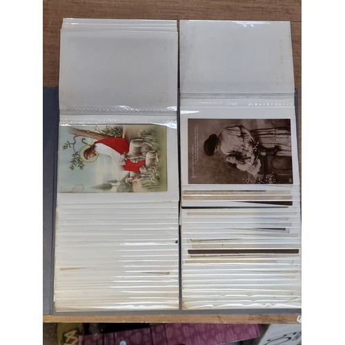 333 - A good Collection of early postcards in a grey album, Mostly late 19th, early 20th cnetury, featurin... 