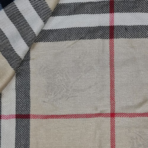 1048 - Star Lot : A fabulous extra large ladies cashmere and silk designer Burberry scarf in the iconic che... 