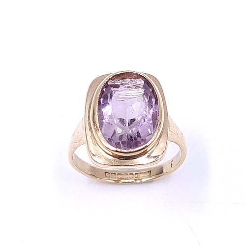 6 - Star Lot : A superb nine carat gold amethyst stone ring With table Georgian Mount. Size - N. Weight ... 