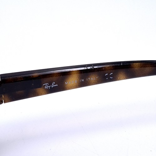 27 - A pair of Ray-Ban 'Made in Italy' faux tortoise shell sunglasses. Serial nos to frames. Lenses clear... 