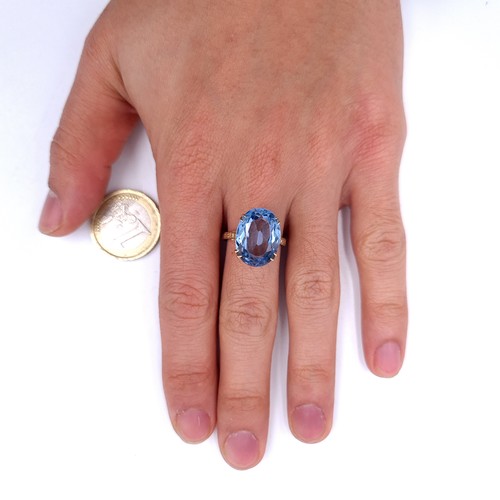 30 - Star Lot : A Fabulous Large blue topaz gemstone ring set in nine carat gold. Size - Q. Weight - 5.1 ... 