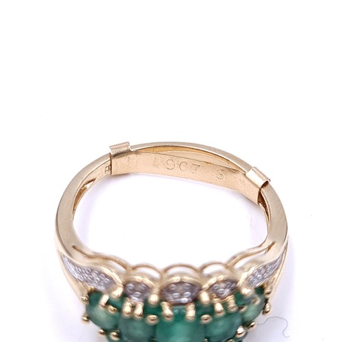 35 - Star Lot : A stunning five gemstone emerald ring with diamonds in 9ct gold . Ring size - P. Weight -... 