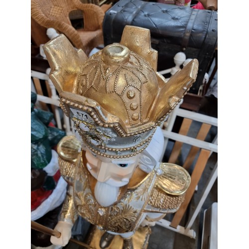 671 - Super Star Lot : A very Large 6 feet tall decorative nutcracker figure with ornate detailing, gilded... 