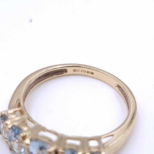 36 - Star Lot : A beautiful five stone graduated aquamarine ring set in nine carat gold. Ring size - O 1/... 