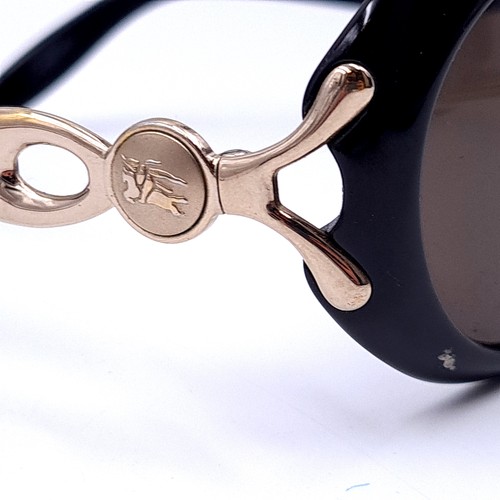 518 - A pair of original designer Burberry sunglasses. Lenses in good, clean condition.