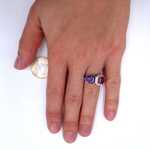 553 - An unusual ruby & amethyst stone ring with white sapphire mount set in sterling silver. Size - M. We... 