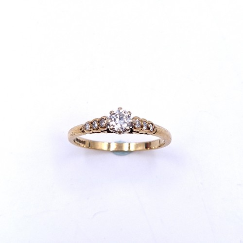 557 - Star Lot : A nine carat gold brilliant cut diamond ring with single cut diamond sides. Total est. we... 