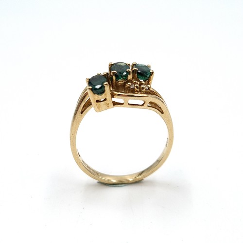 1075 - Star Lot : A stunning 9ct Gold ring with Emeralds and Diamonds. 
Size: M  Total weight: 2.9 g