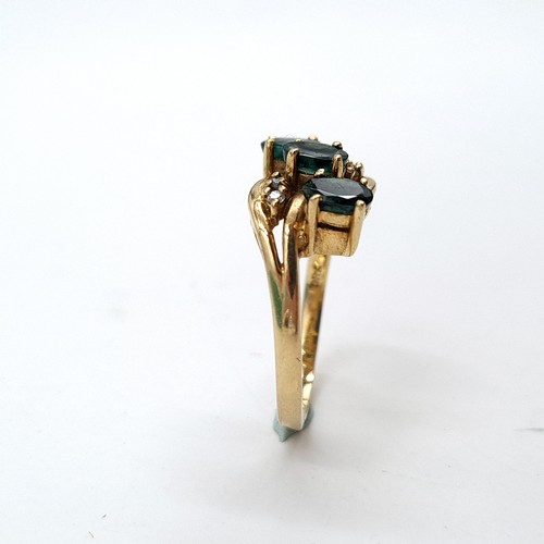 1075 - Star Lot : A stunning 9ct Gold ring with Emeralds and Diamonds. 
Size: M  Total weight: 2.9 g