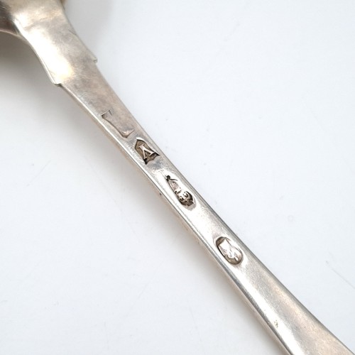 1084 - A very large Irish silver serving spoon hallmarked to Dublin. Weight: 21.6 grams.