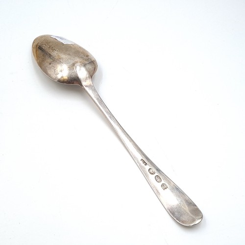 1086 - A very large Irish silver serving spoon. Hallmarked to Dublin and made by Reid & Son silversmiths. W... 