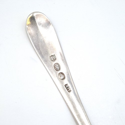 1086 - A very large Irish silver serving spoon. Hallmarked to Dublin and made by Reid & Son silversmiths. W... 