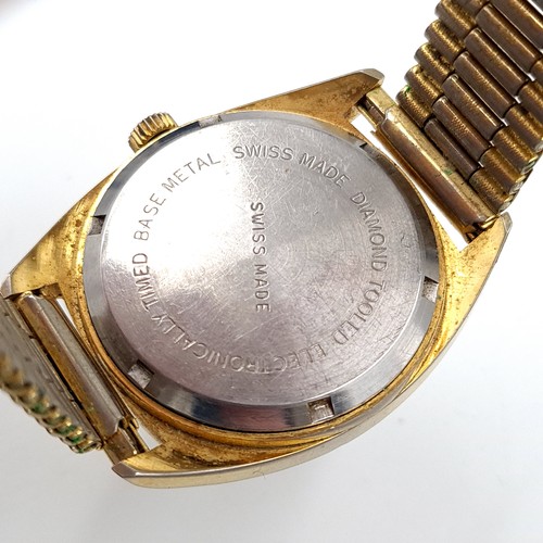 1098 - Star Lot : A Vintage 'Omega' Gents Calendar Wrist Watch. In working condition. It has an aftermarket... 