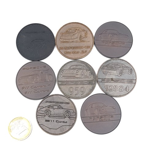 1104 - Eight interesting rare Porsche year Coins. 1985-1998