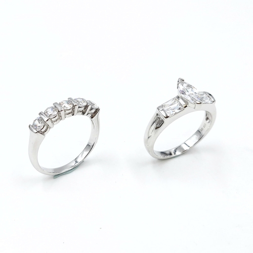 18 - Two promise rings set in sterling silver with cubic zirconia stones. Sizes - U x 2. Weight - 4.13 & ... 