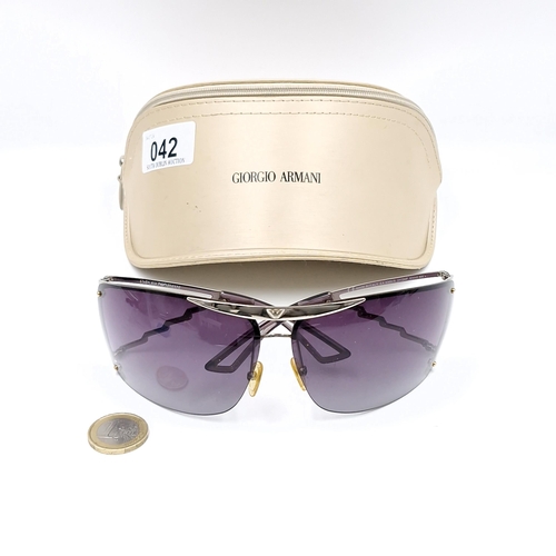 42 - A pair of designer Giorgio Armani wrap round sunglasses. Lenses in good, clean condition. Comes in o... 