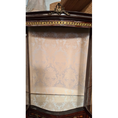 994 - Star Lot : A large beautiful Louis XV-style display cabinet, featuring intricate marquetry and bronz... 