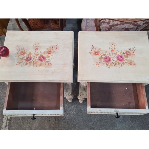 1001 - Star Lot : Pair of hand-painted vintage nightstands, featuring floral motifs and carved details, wit... 