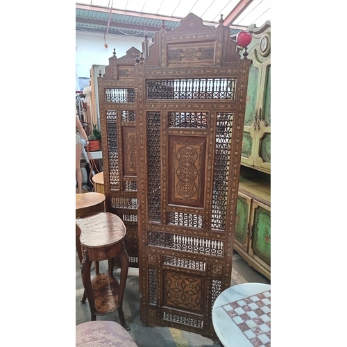 1005 - Super Star Lot : A very cool large Middle Eastern style Carved wooden room divider, featuring lattic... 