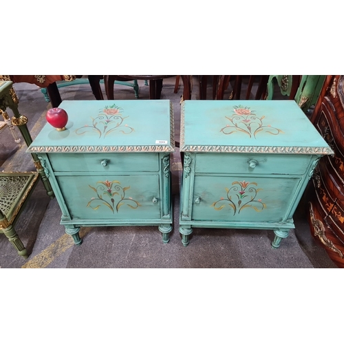 999 - Star Lot : A lovely Pair of hand-painted turquoise nightstands featuring floral motifs and carved de... 