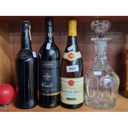 968 - A selection of three wines and a Georgian cut crystal decanter with stopper. Includes a 75cl 2000 E.... 