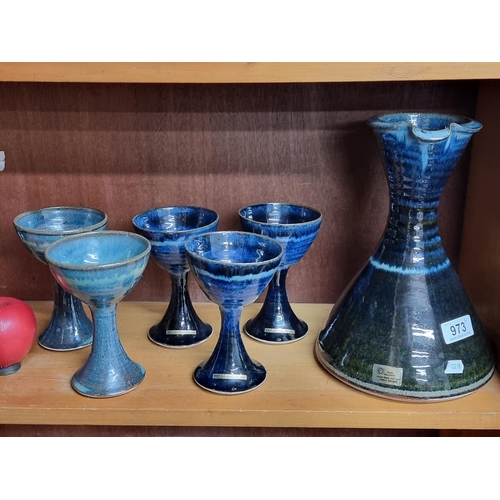 973 - A set of Louis Mulcahy hand made studio pottery includes a wine decanter with six goblets. All have ... 