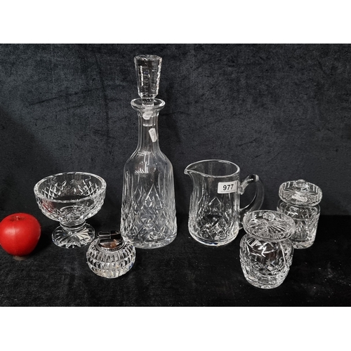 977 - Six pieces of Waterford Crystal including a jug in the Lismore pattern, a mustard pot in the Lismore... 