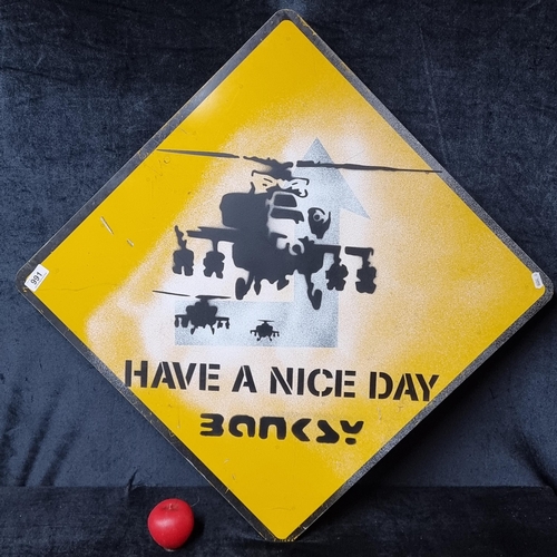 991 - A spray paint on sheet metal Road Sign after 'Banksy' titled 'Have a Nice day'.